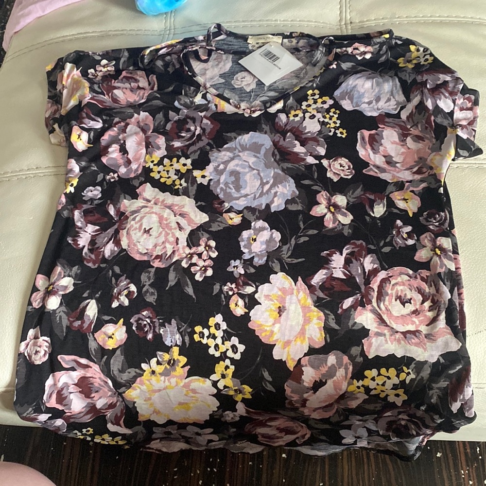 Black shirt with flowers and v neck